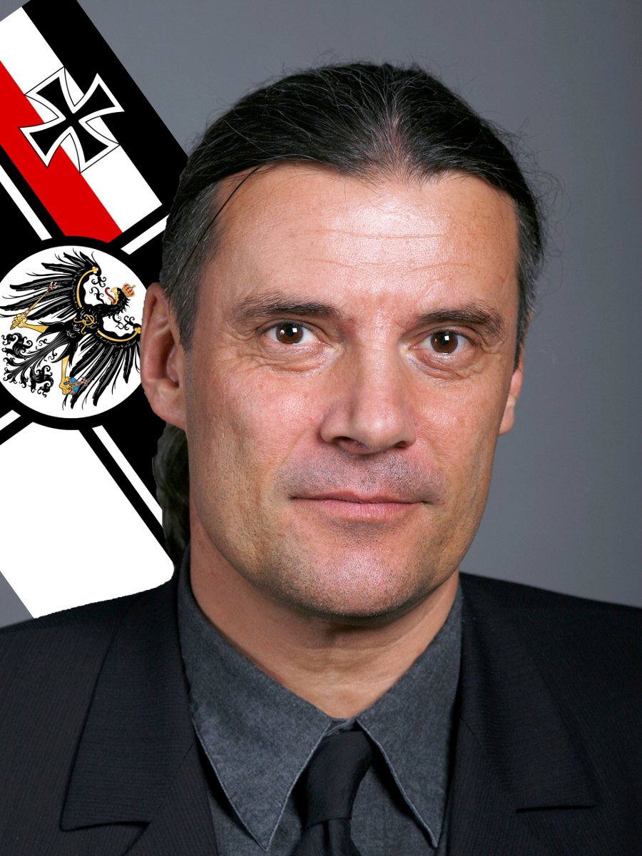 Oskar Freysinger und eine Reichskriegsflagge